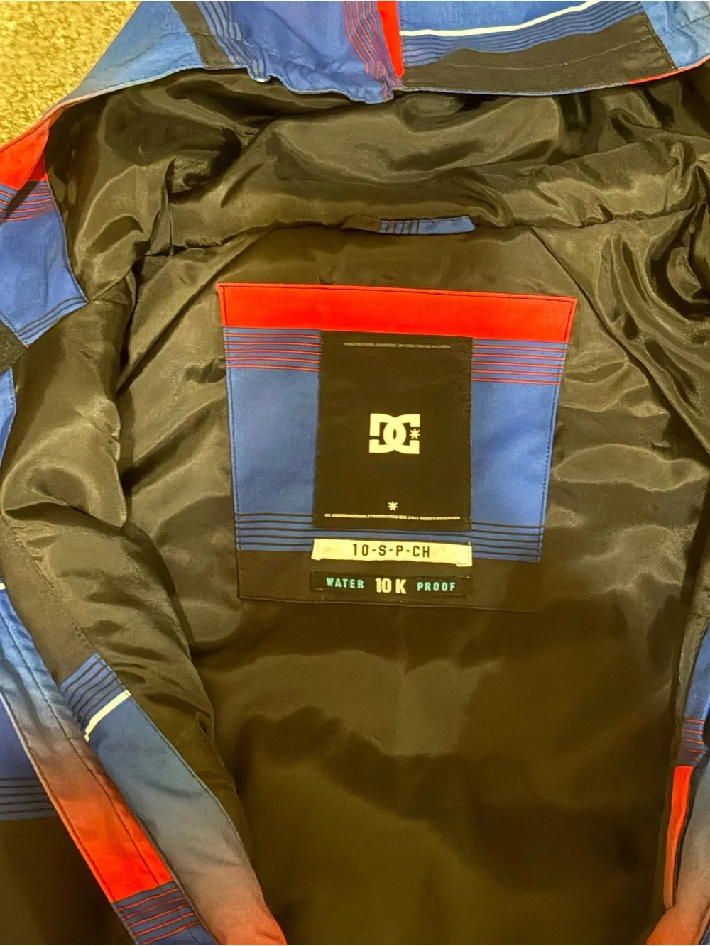 DC Hooded Puffer Jacket in Blue, Red & Black